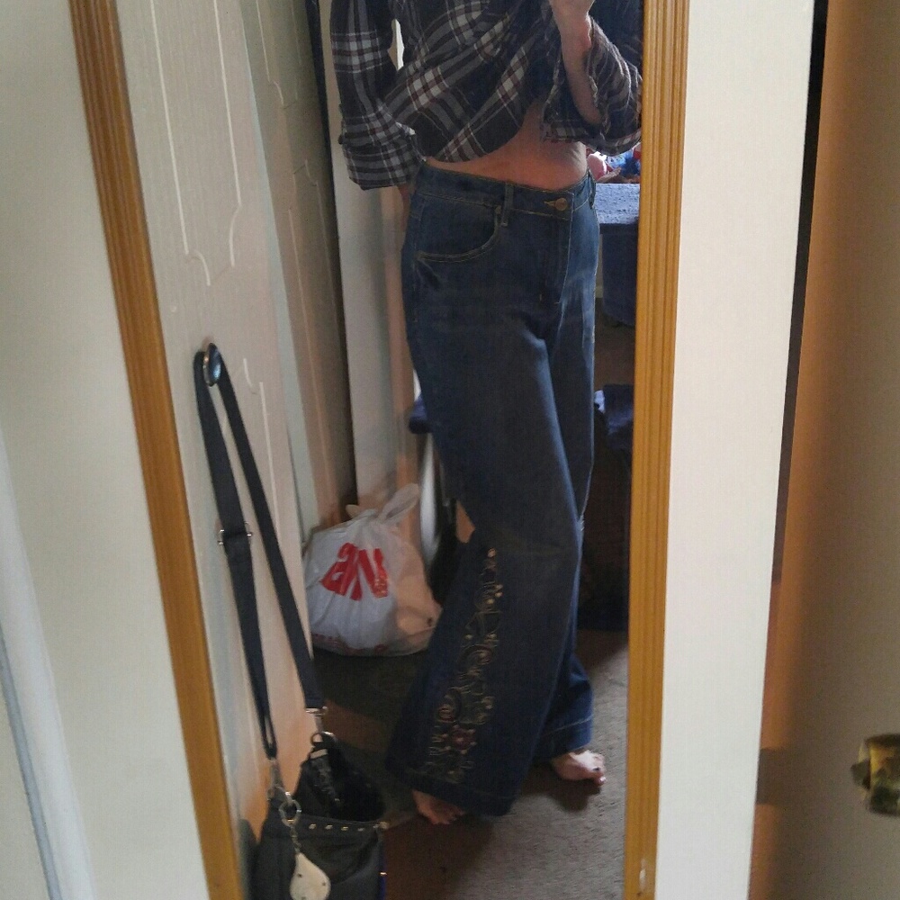 Sequined, flaired jeans, never worn.